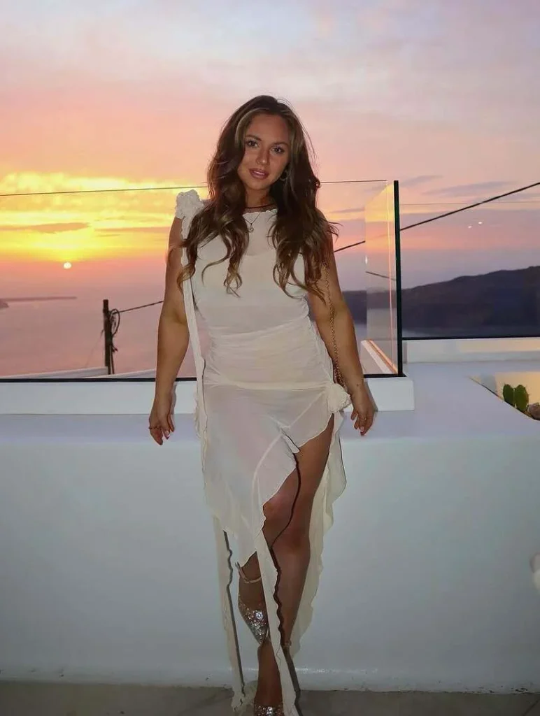 18. White Ruffle Dress at Sunset