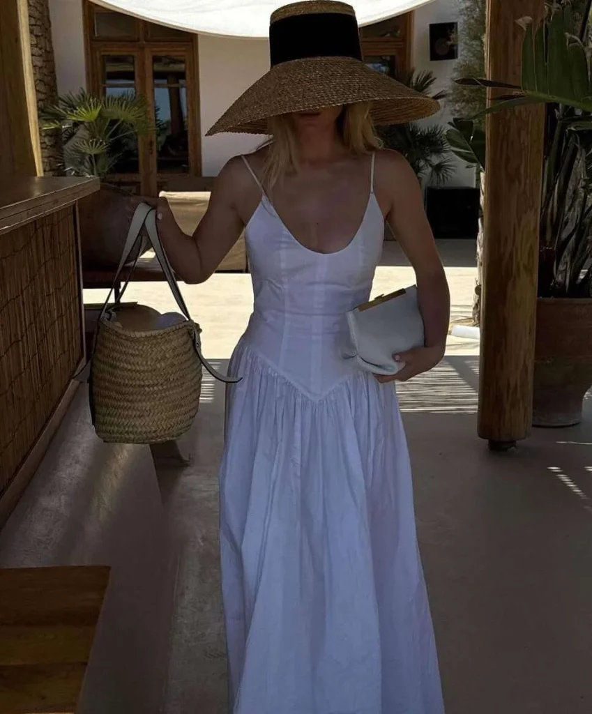 7. White Maxi Dress with Straw Hat