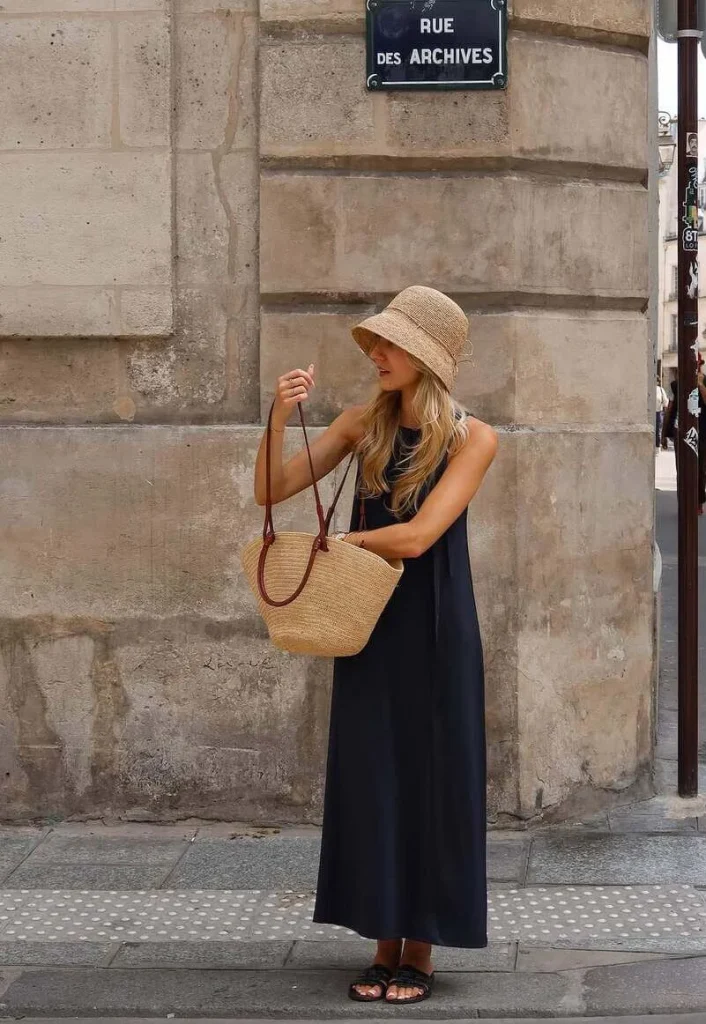 3. Black Maxi Dress with Straw Hat