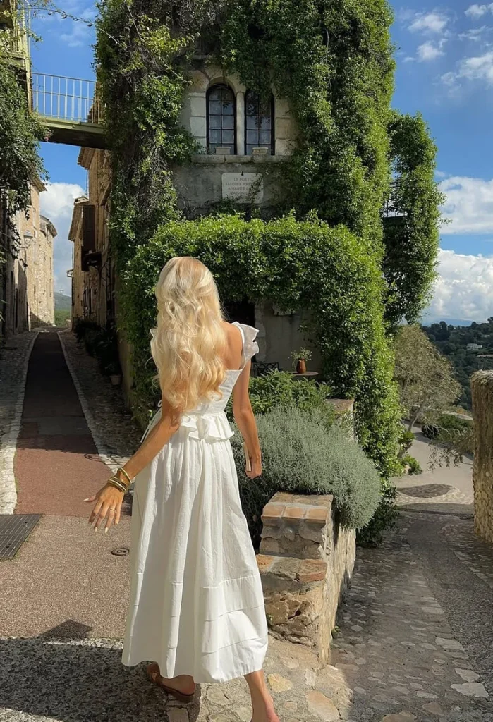 1. White Maxi Dress in a Stone Village