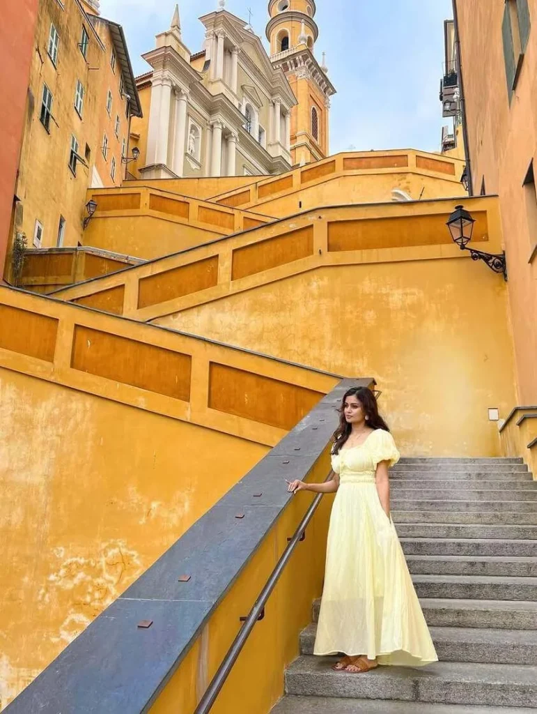 11. Light Yellow Maxi Dress on the Steps
