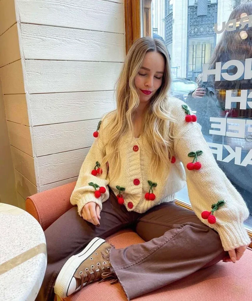 18. Cherry Cardigan and Brown Pants
