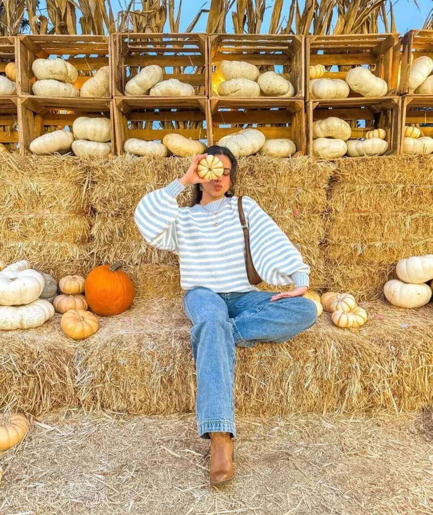 2. Striped Sweater and Straight-Leg Jeans