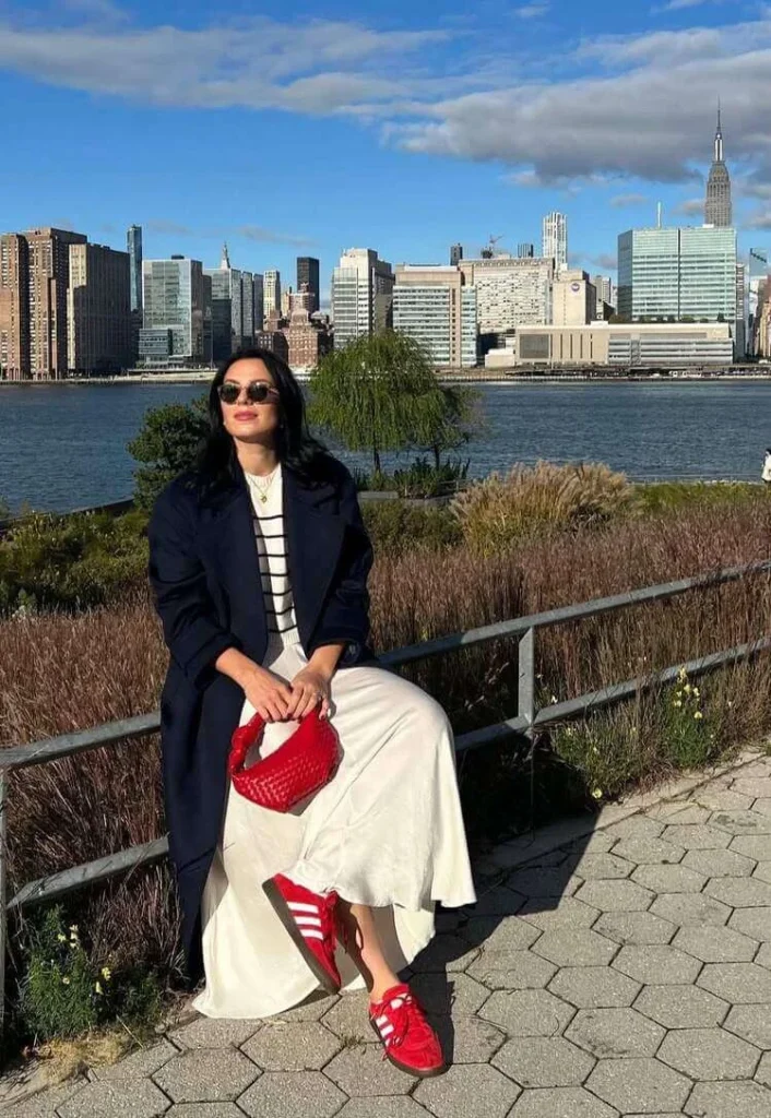 Navy Coat and Maxi Skirt with Red Sneakers