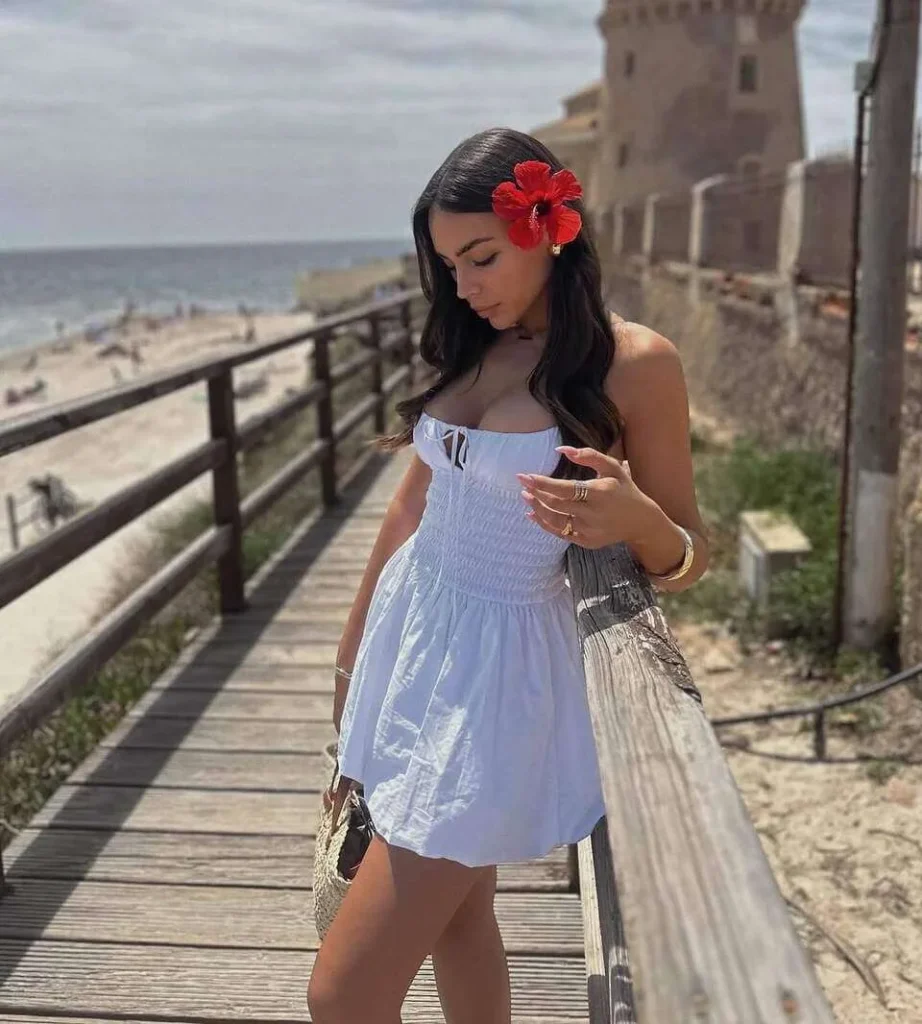 11. White Mini Dress with Flower Hair Clip