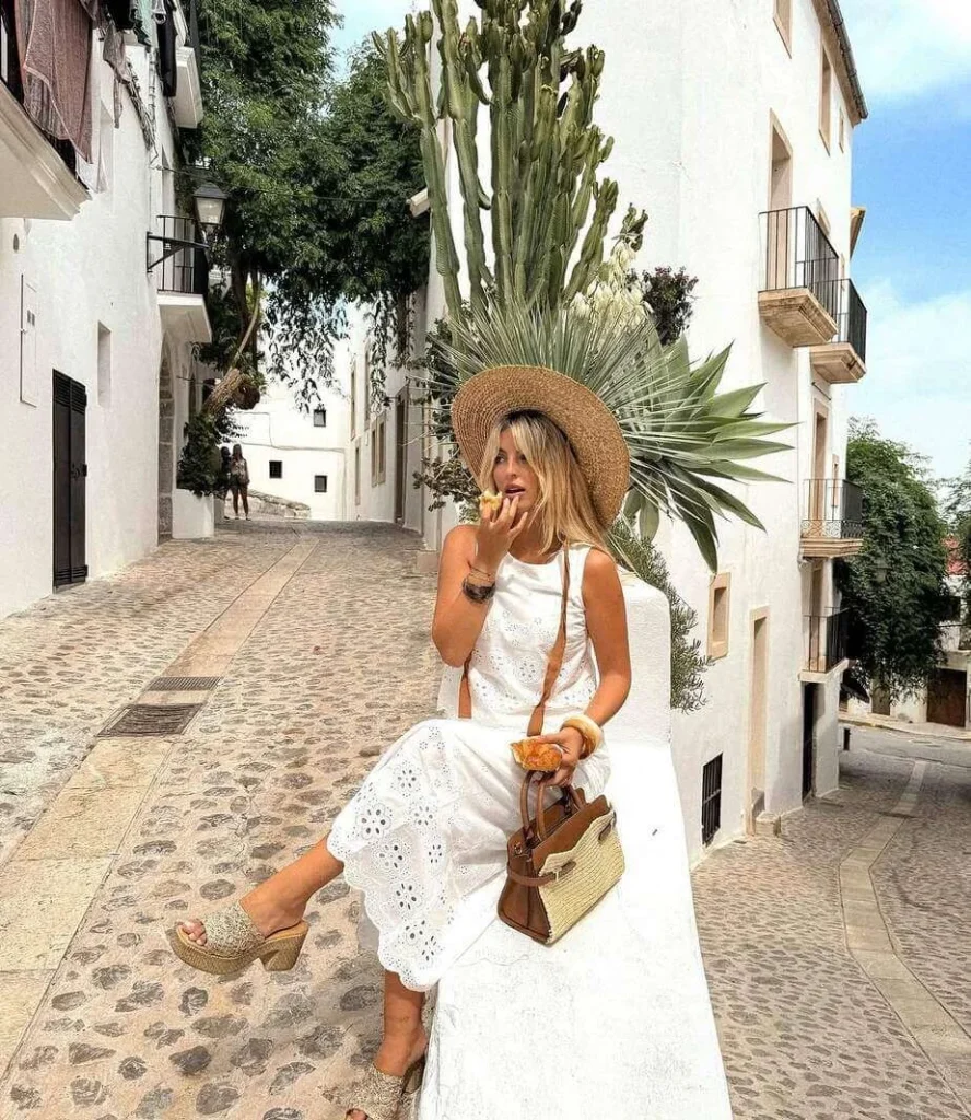 22. White Eyelet Dress with Straw Hat and Clogs