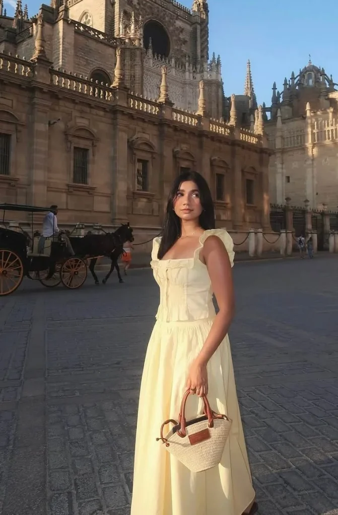 8. Yellow Ruffle Dress with Straw Bag