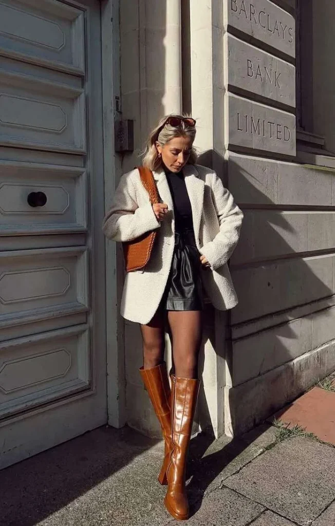11. Tan Knee Boots with a Textured Coat